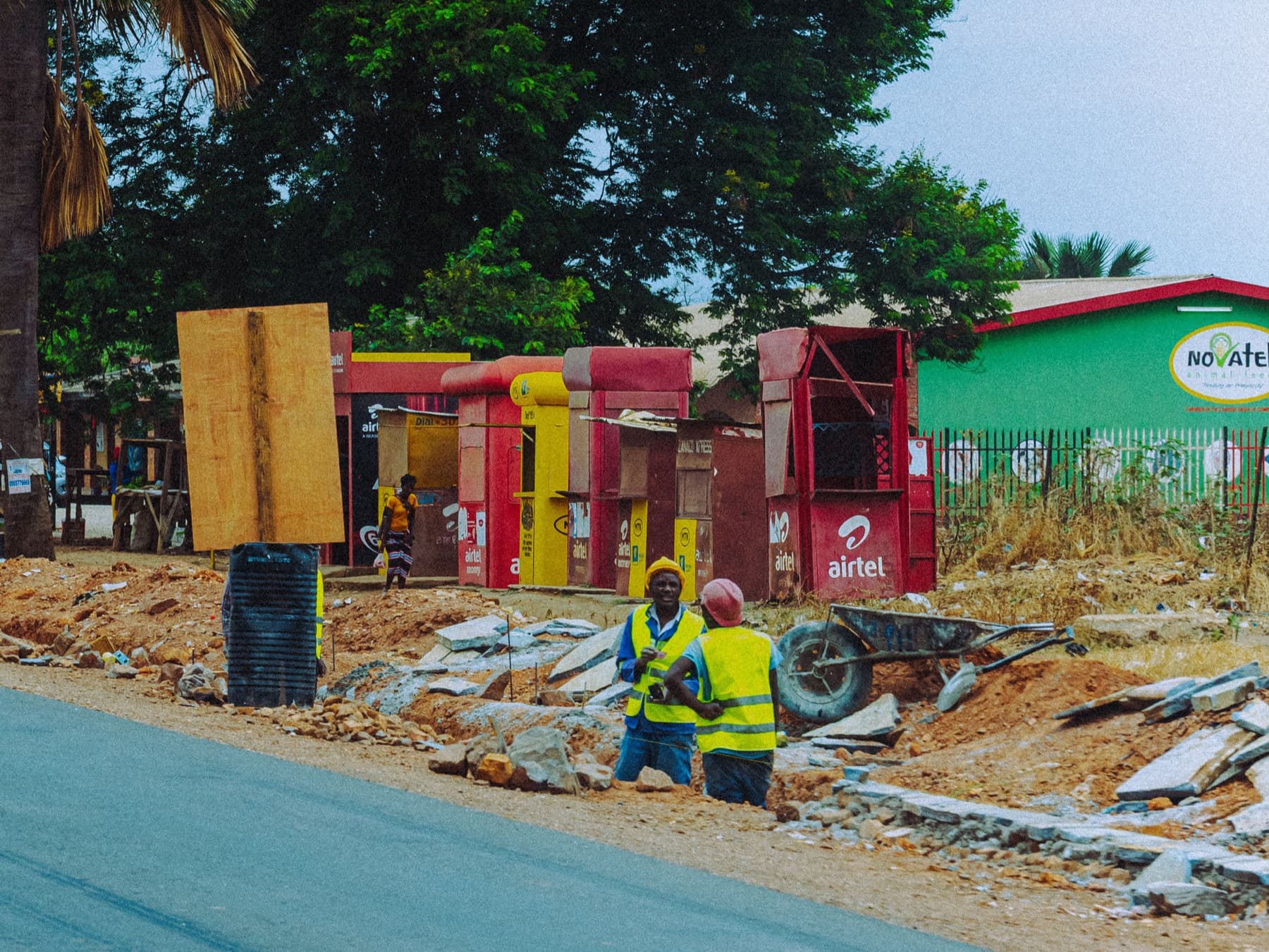 African construction workers on an urban street project